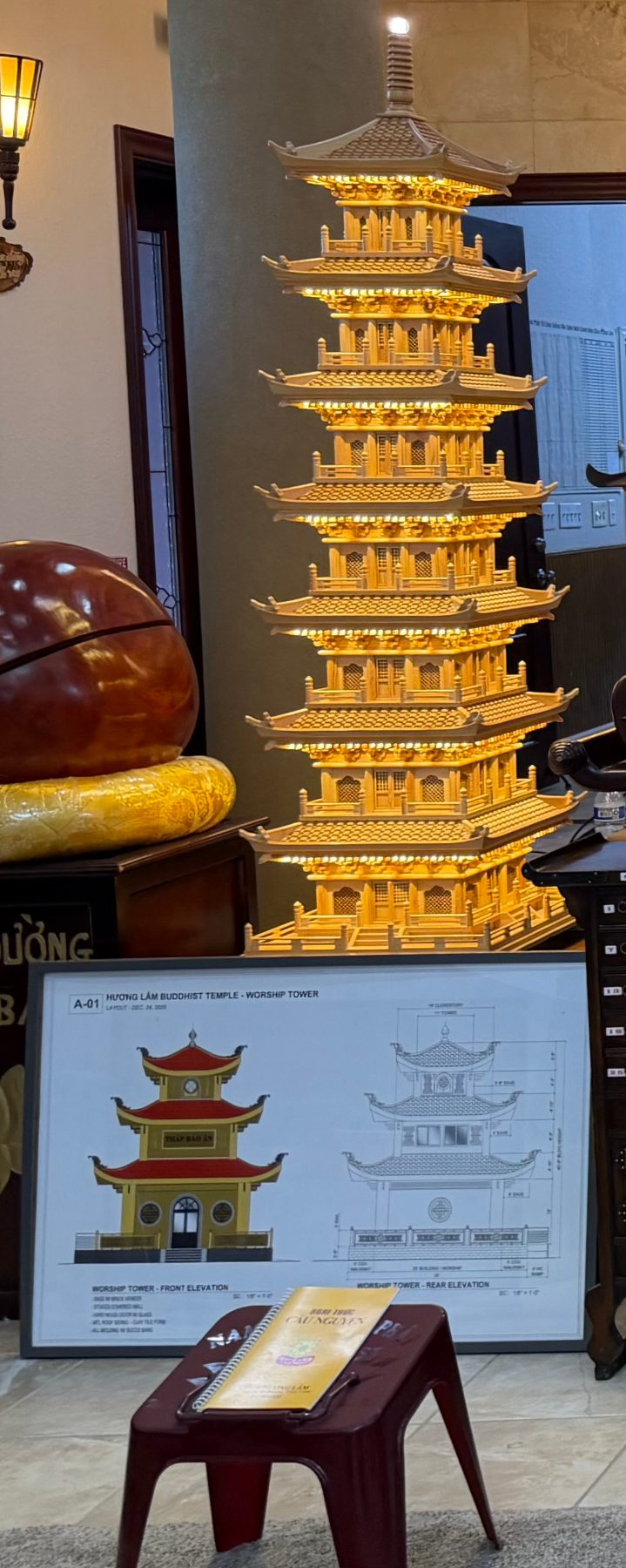 Model of the worship tower and its elevation drawings in the main hall