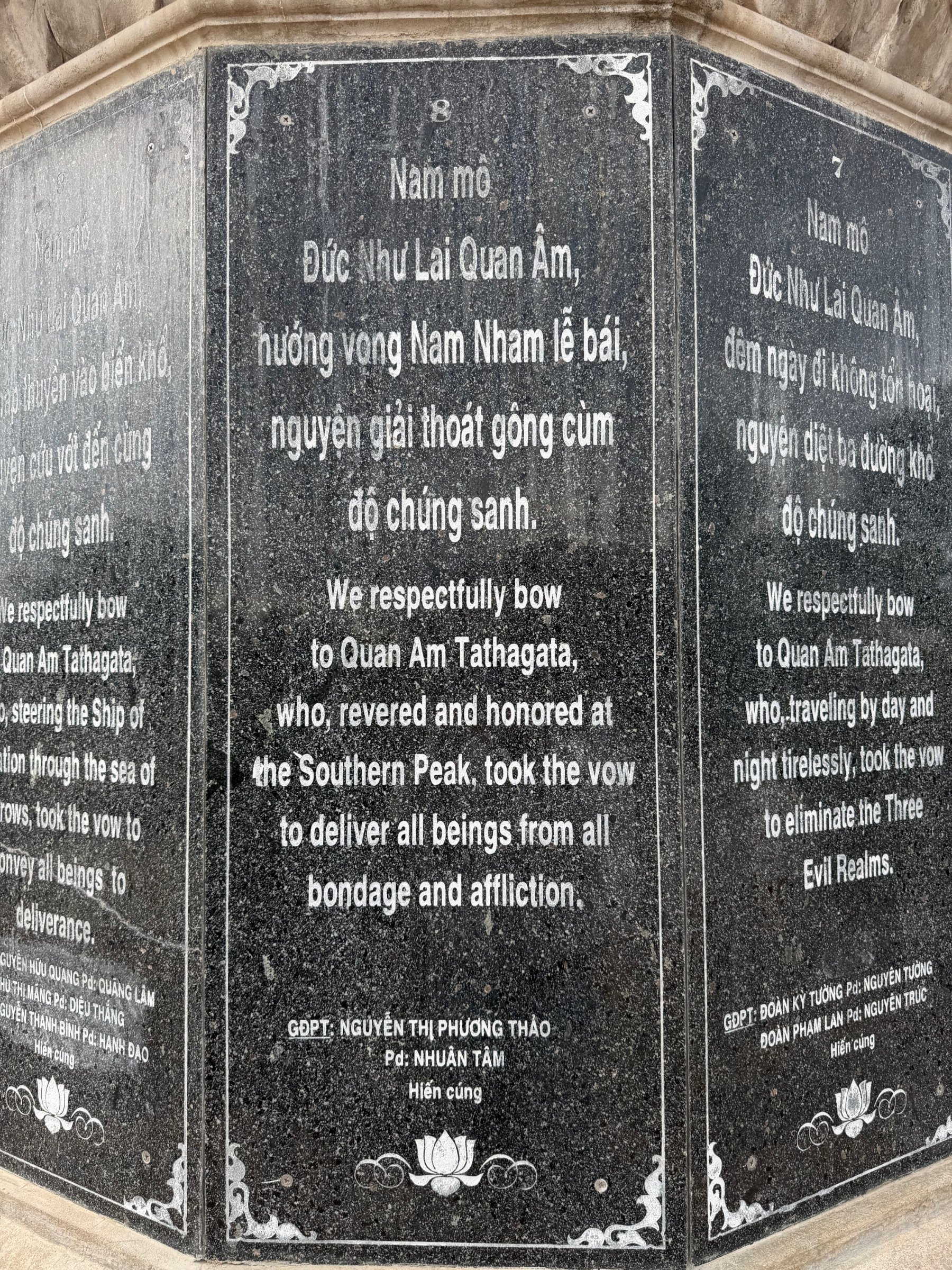 The pedestal of the Quan Âm statue: the face carved with vow 8