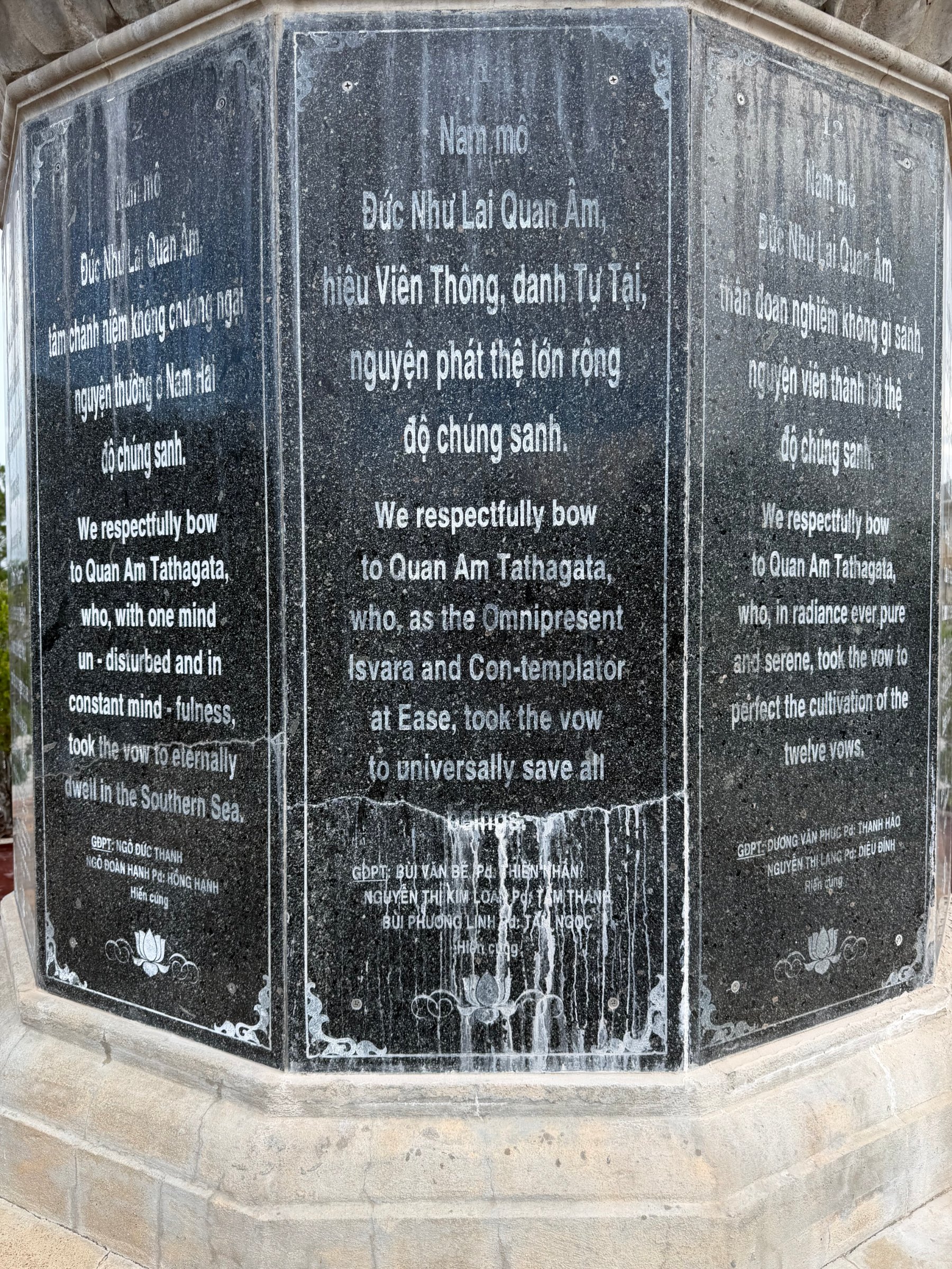 The pedestal of the Quan Âm statue: the face carved with vow 1